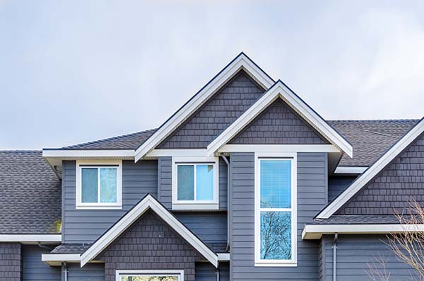 Cedar shake siding installation by Custom Exteriors
