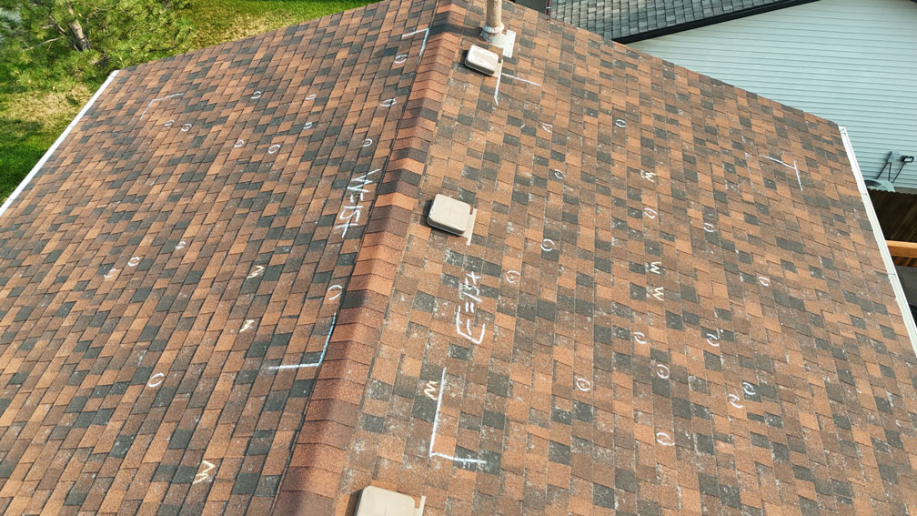 West-Greeley-Roof-Replacement - Custom Exteriors, LLC Overview of Damage Main Elevation