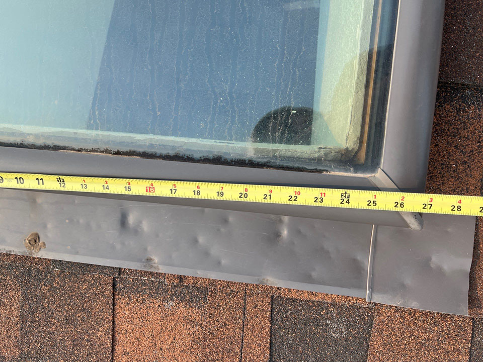 West-Greeley-Roof-Replacement-4 - Custom Exteriors, LLC Damaged Flashing Surrounding Skylight