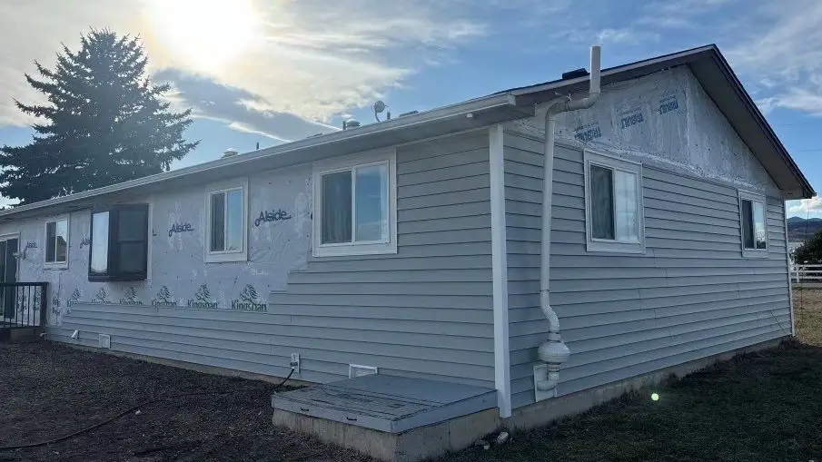 siding install - Custom Exteriors, LLC Siding being replaced on a Berthoud home.